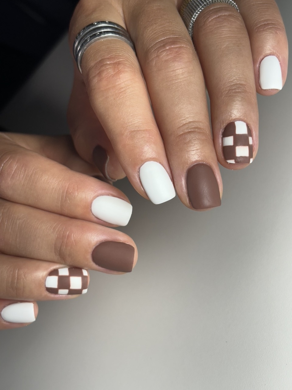 White and brown chess European-style manicure design example
